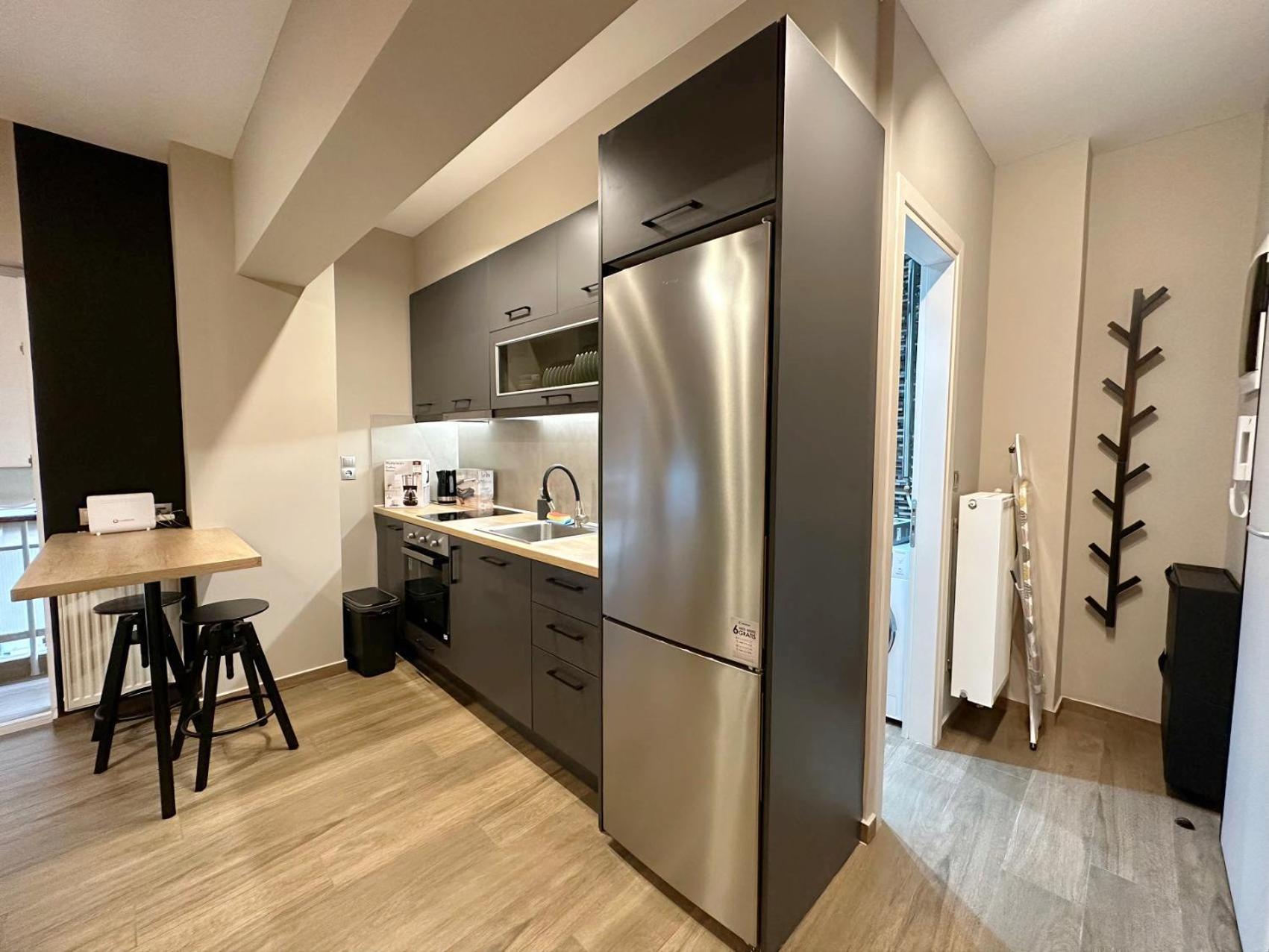 Wsd Sfaelou Apartment Hotel Atene Esterno foto